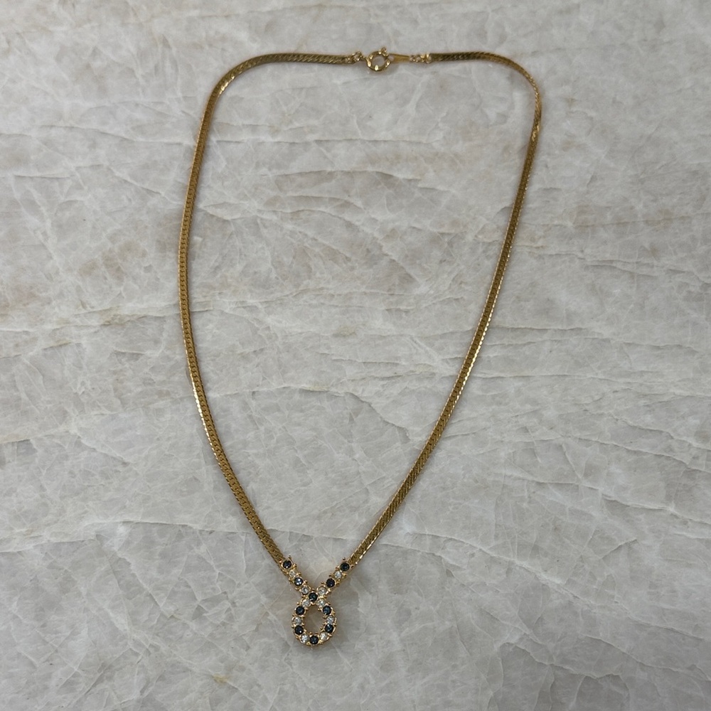 Avon Gold-Tone Necklace with Blue and Clear Crystal Circle Pendant